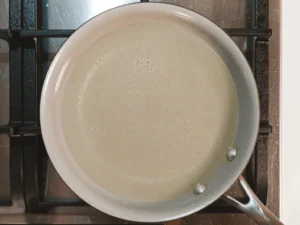 Classic simple syrup in a pan.